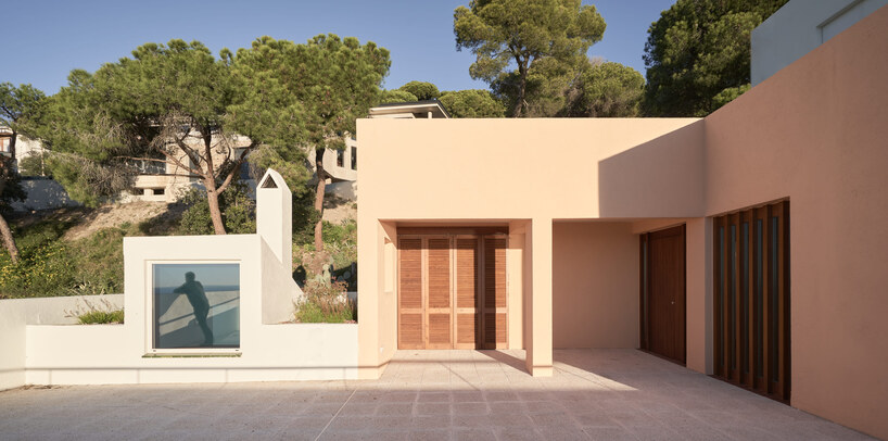 open patios and white geometric terraces extend casa blajot along catalan coast - 2