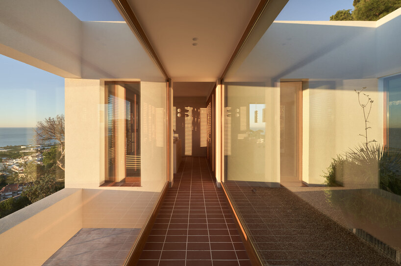 open patios and white geometric terraces extend casa blajot along catalan coast - 7