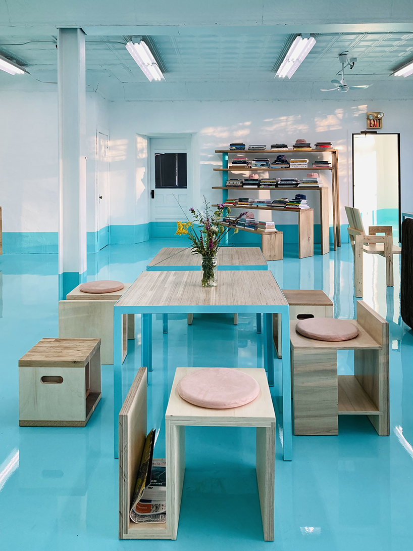 reclaimed oak, cork, and cardboard build flexible furniture for cultural hub in NY - 3