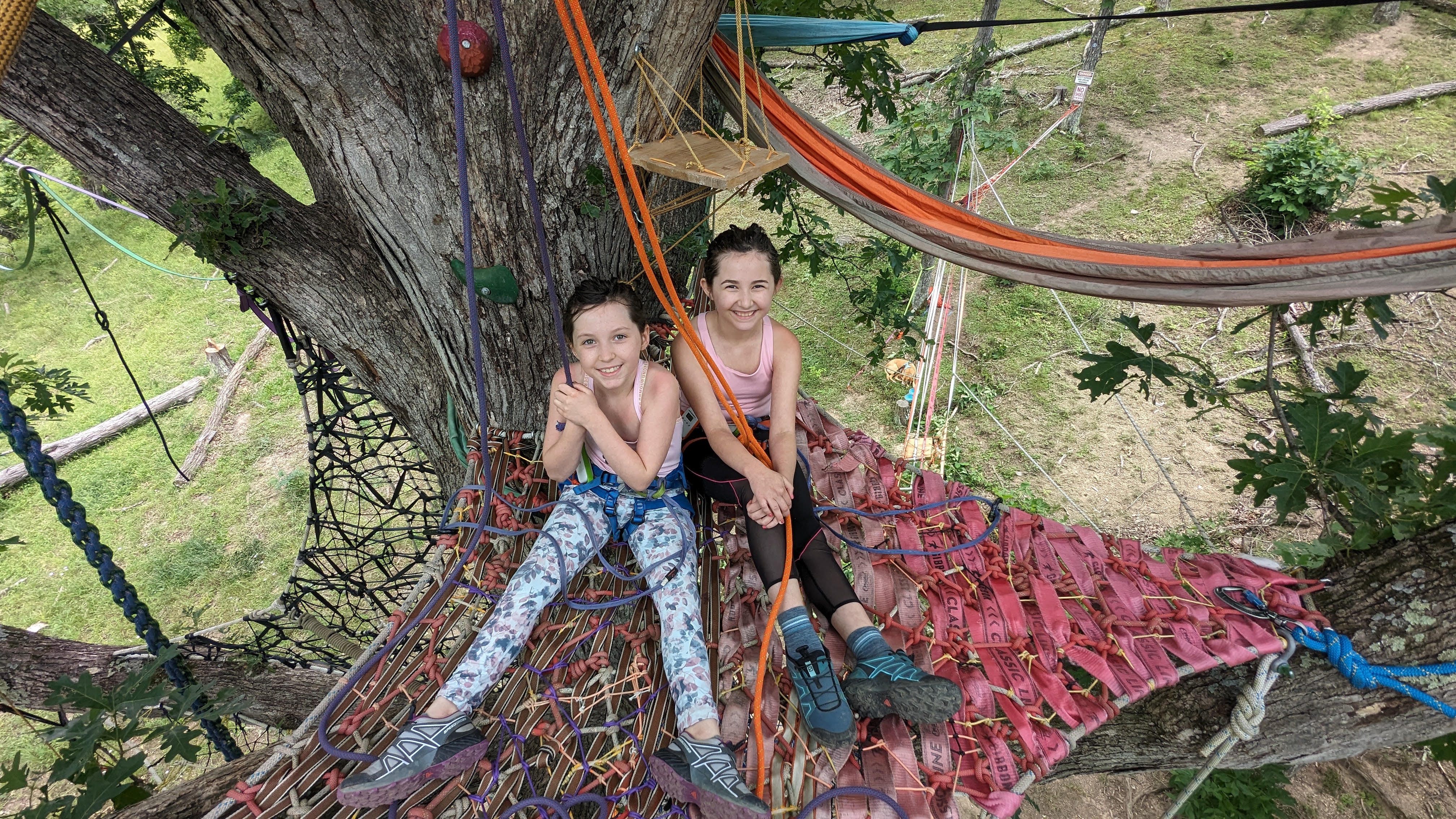 Visitors at Fourth Moon Camp can sleep high up in a tree net or hammock.