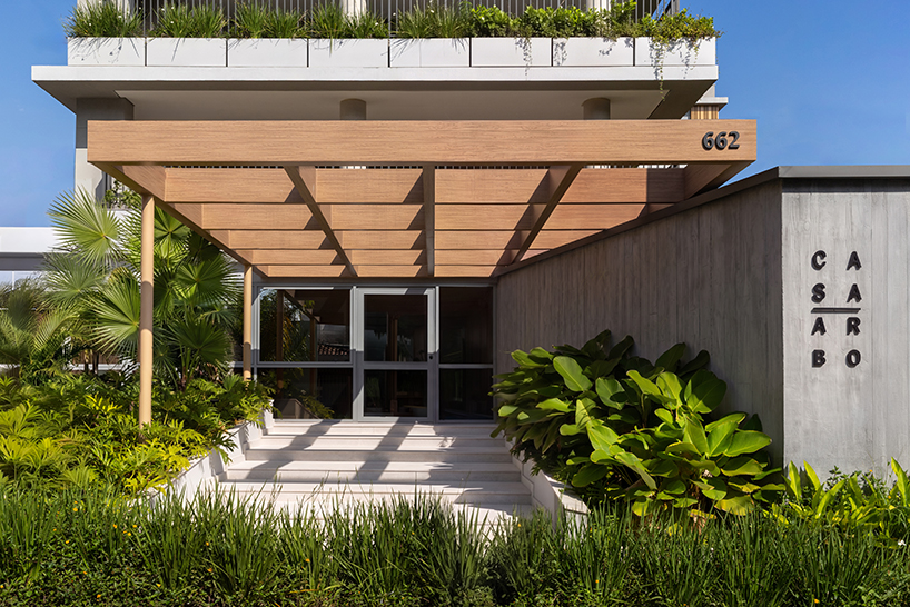 wrapped in concrete, wood, and greenery, perkins&will's residential tower rises in são paulo - 3
