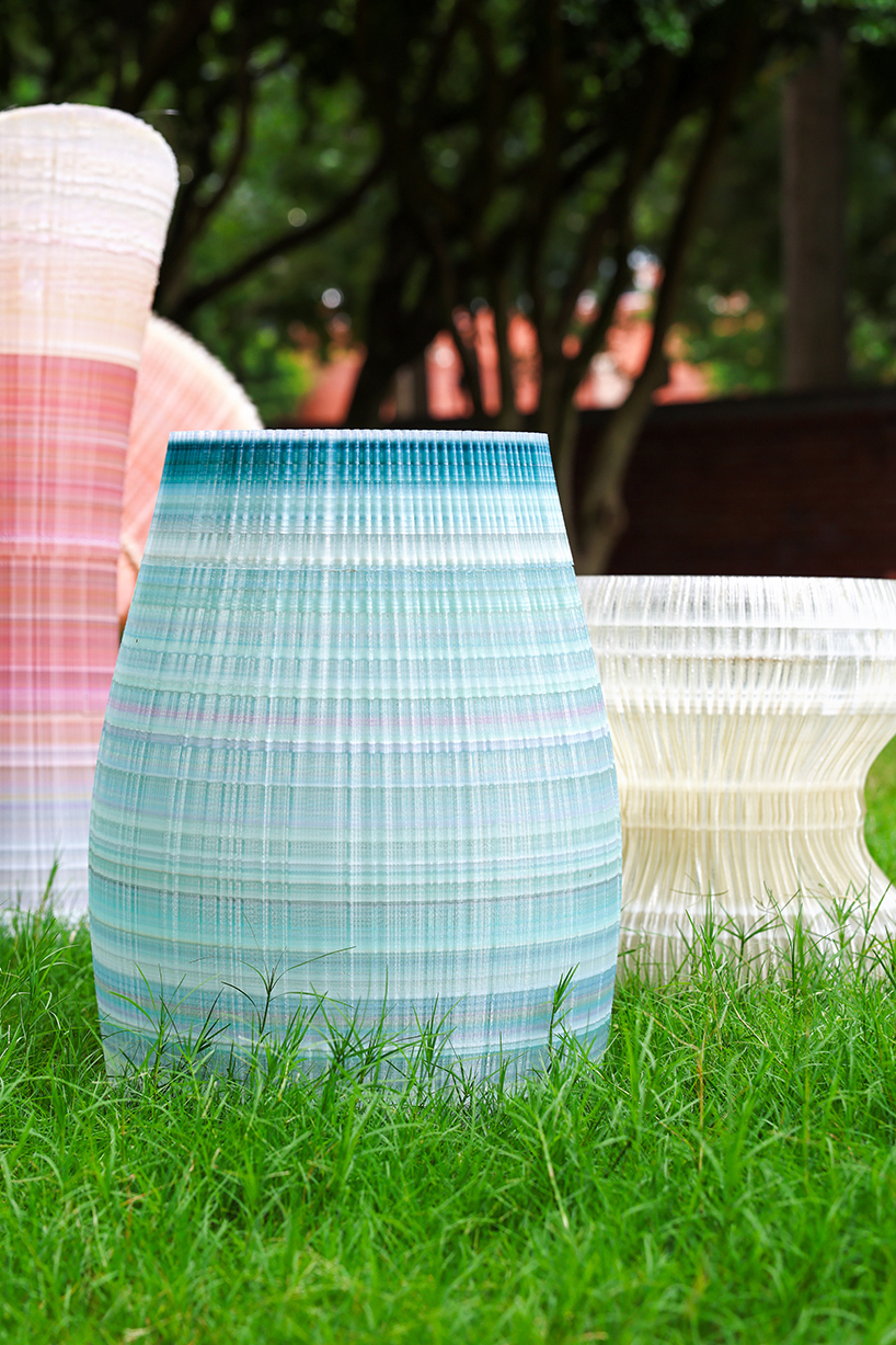 ninefold transforms discarded plastic into an immersive field of sound light and architecture 8