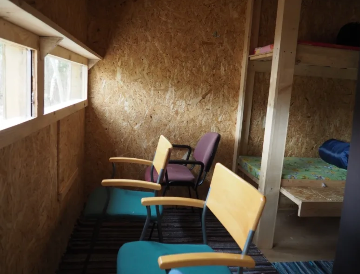 Northern windows overlook a taiga forest, while the southern windows provide views of a stream and flooded meadow.